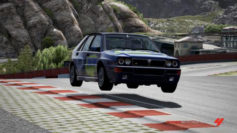 Lancia Delta Integrale jumping at Iberian Circuit.jpg